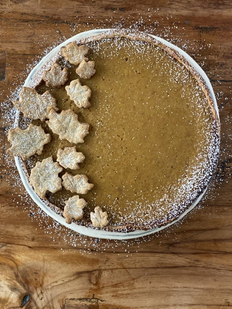 Maple Pumpkin Pie decorated with pastry leaves and dusted with icing sugar Pure Maple Syrup